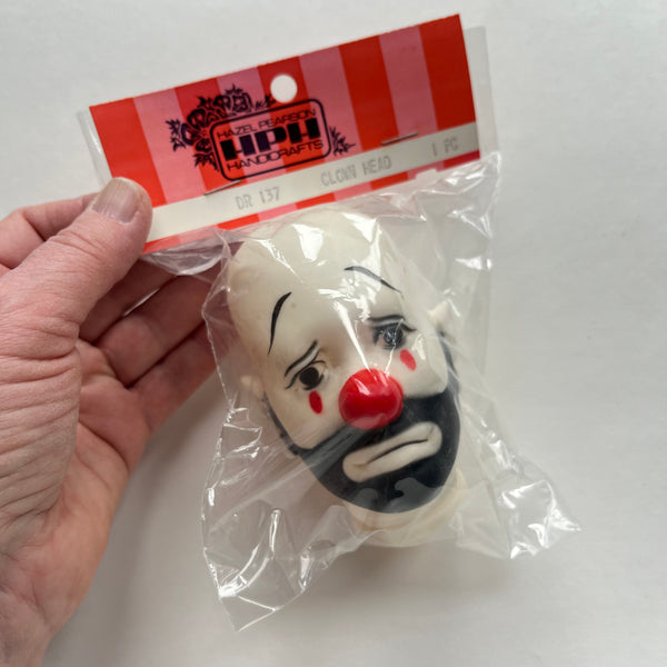 Sad Clown Doll Heads