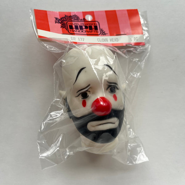 Sad Clown Doll Heads